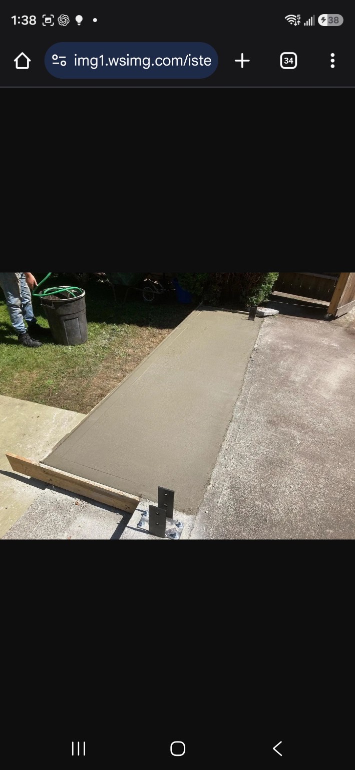 Concrete walkway connection and edge finishing by Fairytale on Vancouver Island