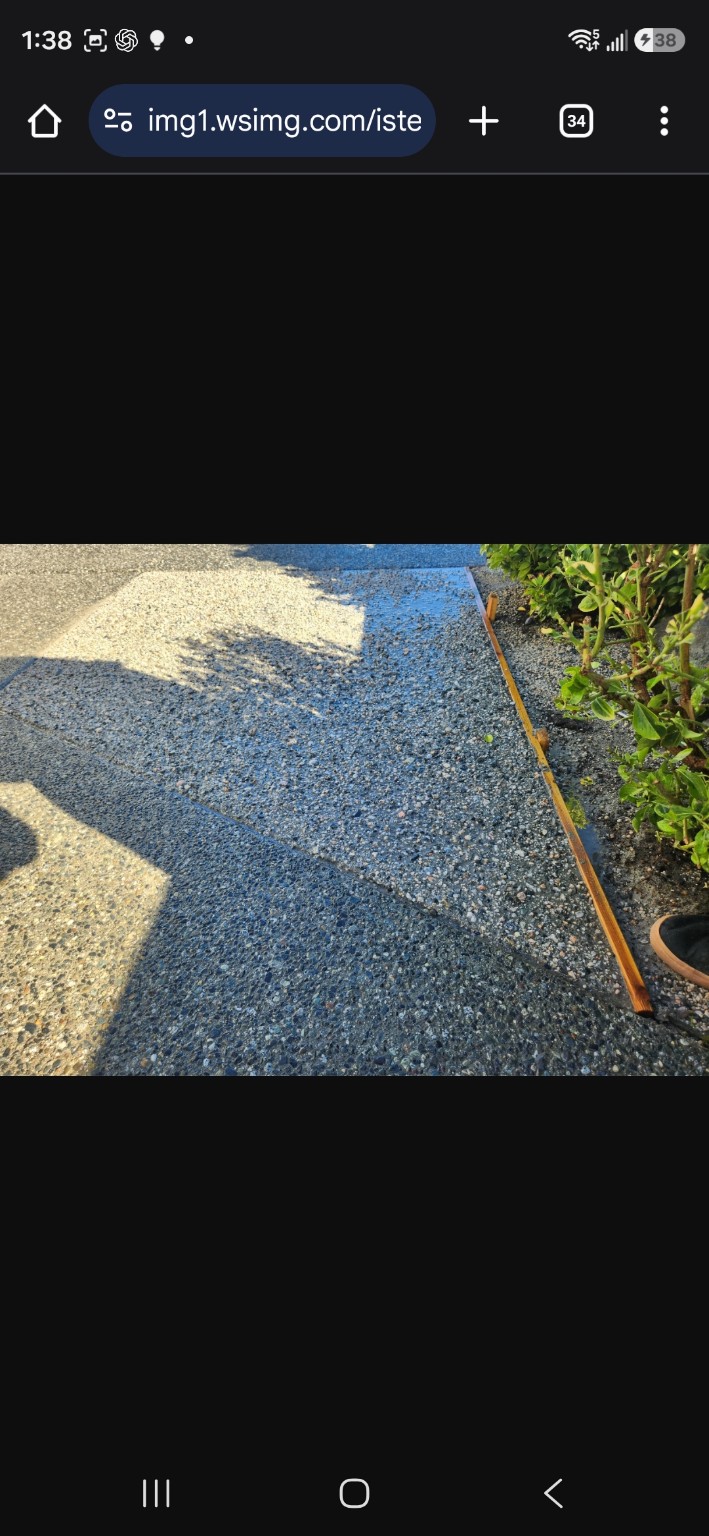 Custom exposed-aggregate concrete walkway finishing on Vancouver Island