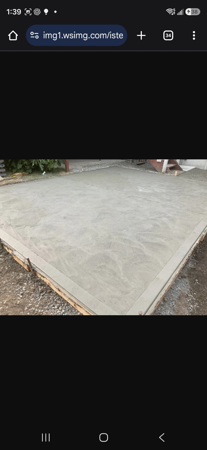 Poured concrete patio pad with timber edge forms in Nanaimo, BC